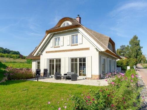 Landhaus Max in Moritzdorf - Luxus unter Reet mit Seeblick, Kamin, Sauna