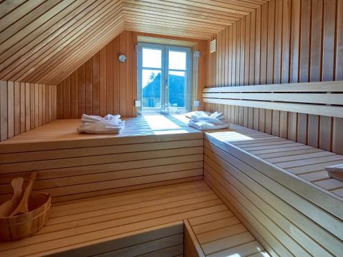 Sauna, Landhaus Max in Moritzdorf - Luxus unter Reet mit Seeblick, Kamin, Sauna in Altensien