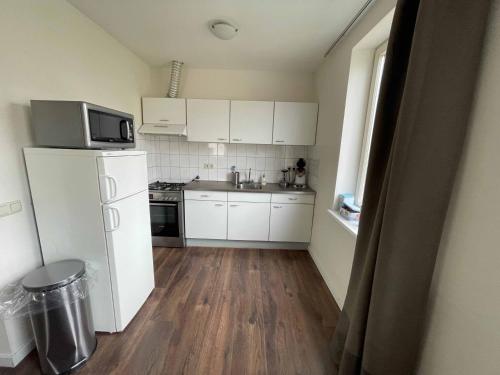 keuken, TopSleep Apartments 26-1 in Arnhem