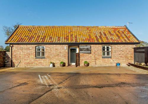 The Domini Cowshed at Village Farm