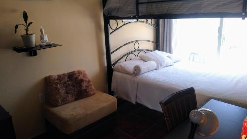 Habitacion con dos camas dobles y baño propio in Puebla, Mexico