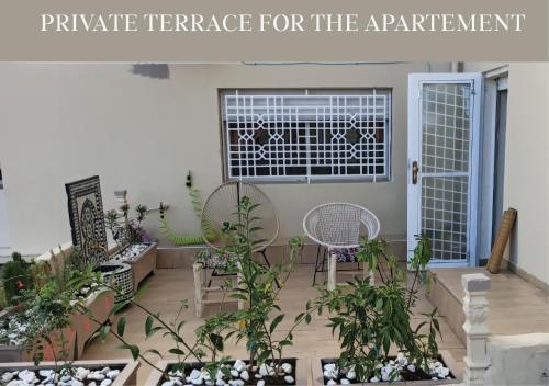 정원, appartement julia au centre ville agadir dans résidence borj dalat (appartement julia au centre ville agadir dans residence borj dalat) in 아바투아
