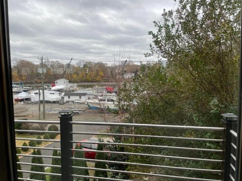 One bedroom with modern kitchen, balcony with water view One bedroom with modern kitchen, balcony with water view