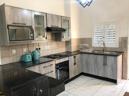 Palm29 at Sunset Mews, Grand Palm - self catering appartment - Your Ideal Getaway for Work or Relaxation, Gaborone (fotografie 5)
