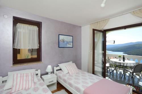 Two-Bedroom Apartment with Balcony and Sea View