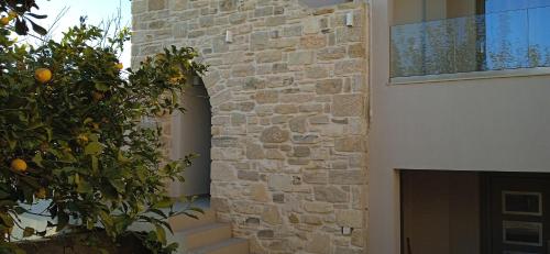 Kamilari Epavlis Luxury Apartments Ground Floor - Tap to explore photos