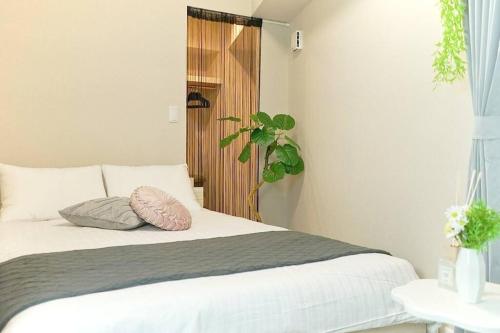 USJ 5min , 4min Walk to Nishikujo Sta , Direct to Namba & KIX , Residential Hotel Alex 2F-4F - Tap to explore photos