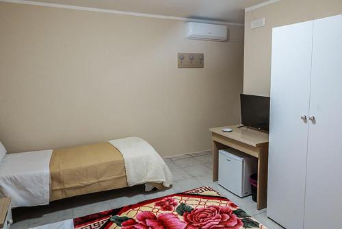 Suisse hotel Room Type - Quadruple Room with Private Bathroom