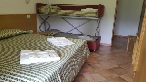 Casa Santa Maria Casa Santa Maria is conveniently located in the popular Folgaria area. The hotel offers a high standard of service and amenities to suit the individual needs of all travelers. Shuttle service, elevato