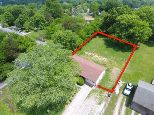 Center of Hendersonville with a fenced backyard