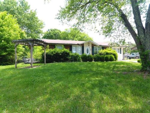 Center of Hendersonville with a fenced backyard