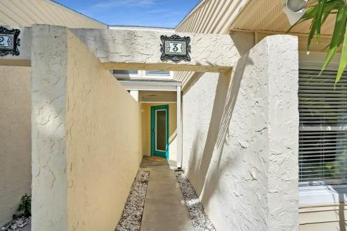 Sapphire Skies! Sweet Beach Condo Steps from the Sand and Surf