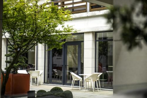 Garten, Best Western Premier Hotel de la Paix in Reims