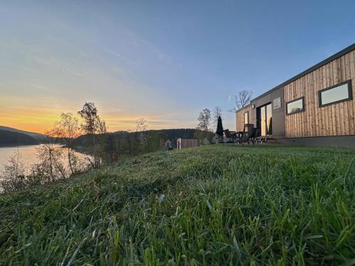 Holiday home with terrace and lake view