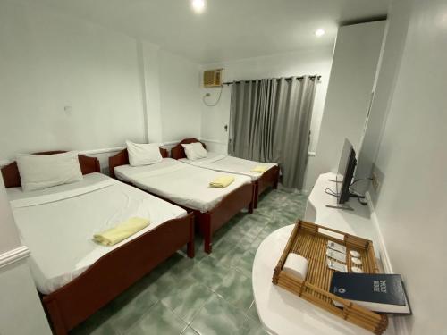 นอร์ธ ชอร์ส อินน์ (North Shores Inn) in คูริเมา