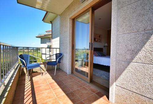 Piso con terraza a un paso de Playa de A Lanzada