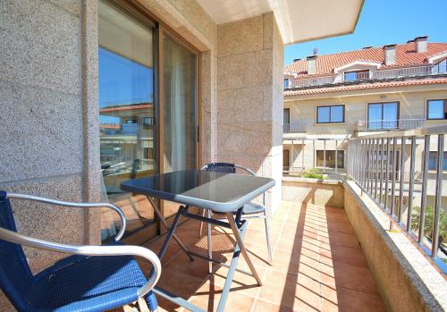 Piso con terraza a un paso de Playa de A Lanzada