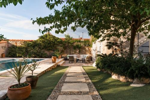 Villa Estelle, Timeless Design in Ancient Stone