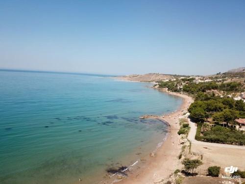 Villa MALOUGA avec piscine à 130m de la plage