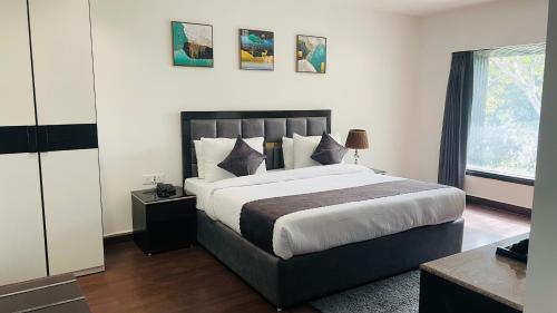 Bett, Saltstayz Select - Chanakyapuri near Indira Gandhi Gedächtnis Museum