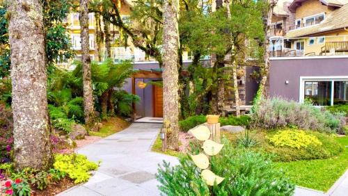 Garden, Apto LINDO com lareira, piscina aquecida e jacuzzi in Carniel