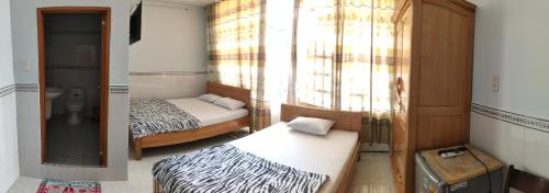 Double Room with Balcony (2 Adults + 1 Child) image 1