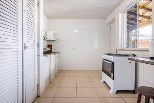 Casa 4 quartos, 2 suítes, piscina e acessibilidade - Frente para a lagoa (Casa 4 quartos, 2 suites, piscina e acessibilidade - Frente para a lagoa) in Balneario das Conchas