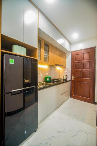 Lily Hometel - Confetti Apartment Nguyen Cong Tru - 주방