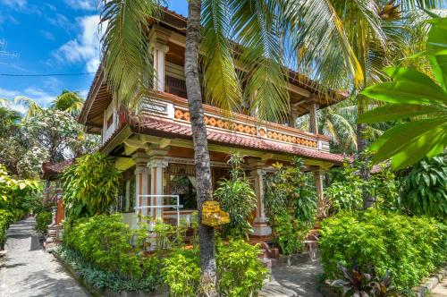 Paradise Palm Beach Bungalows and Dive Center