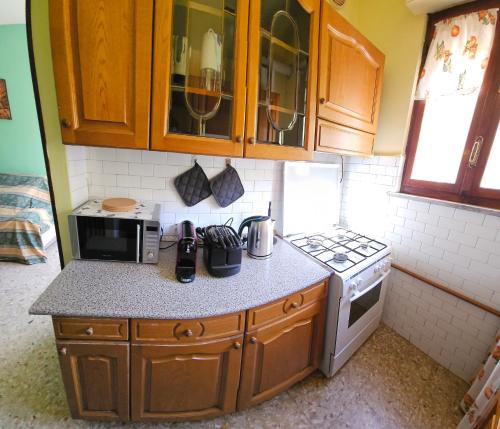 廚房, Appartamento b&b 'Casa Vittoria' in 聖安托尼諾迪蘇薩