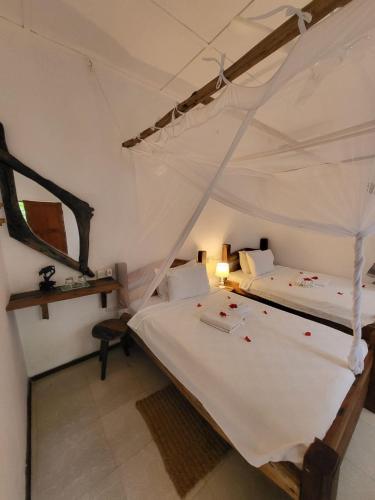 巴巴勞平房飯店 (Babalao Bungalows) in 桑吉巴