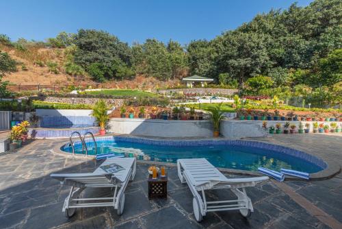 SaffronStays Caramelo - a private heated swimming pool villa with Jacuzzi nestled amidst beautiful landscaping and gardens in Lavasa, Lavasa