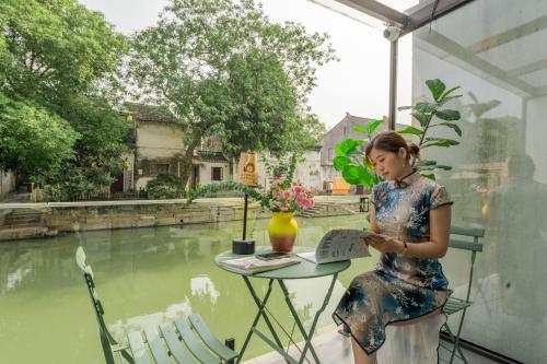 Tongli Slowlife River View Inn - Suzhou