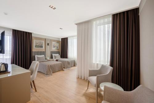 Porto Bello Hotel Resort & Spa Room Type - Family Room (4 Adults)