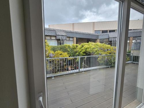 Four-Bedroom Apartment with Balcony 