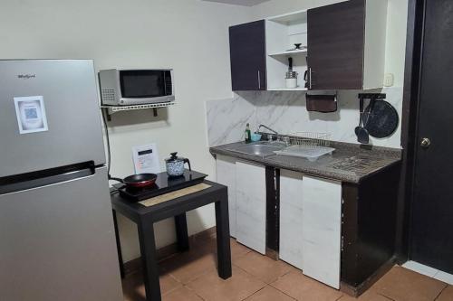 Suite con 2 recamaras,2mini splits, Parking Wifi 100 mb, cocina