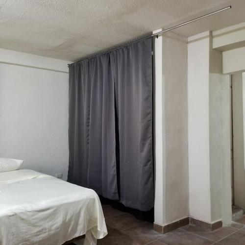 Suite con 2 recamaras,2mini splits, Parking Wifi 100 mb, cocina