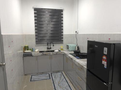 1022 négyzetméteres, 3 hálószobás Ház 2 fürdőszobával Mentakab területén (Farisya GuestHouse Bandar Jengka) in Jengka