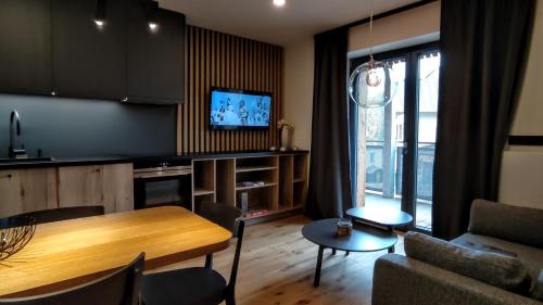 Moderní rodinný 3KK apartmán D8 v centru Harrachova s výhledem na skokanské můstky - by Relax Harrachov Harrachov