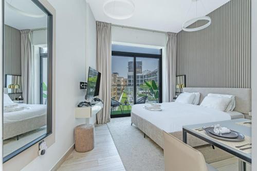 Elegant Studio Stay I Pool, Gym & Parking, Dubaï (photo 2)