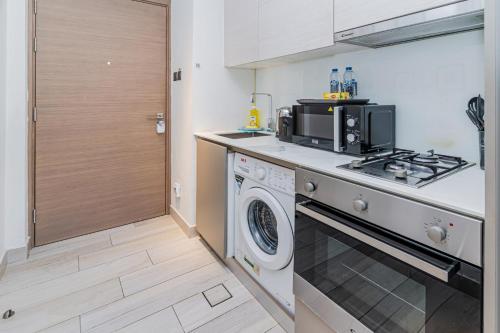 Elegant Studio Stay I Pool, Gym & Parking, Dubaï (photo 10)