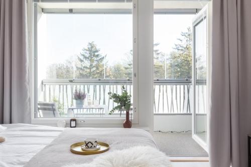 Balcony/terrace, Modern studio by Finnoo metro in Nuuksio