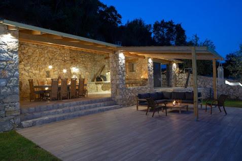 Modern country villa with stone-built BBQ area