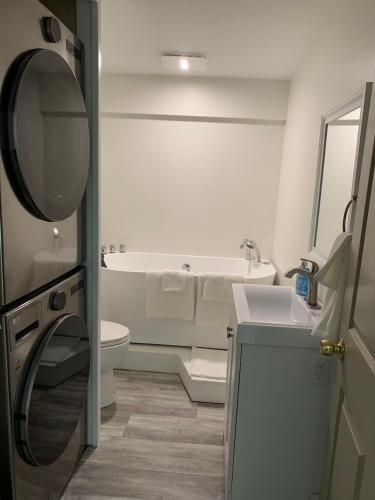 School Village Walk-in shower and jetted tub