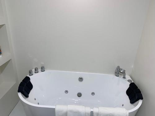 School Village Walk-in shower and jetted tub