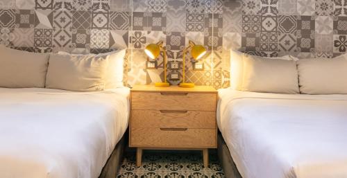 Deluxe Queen Room with Two Queen Beds image 1