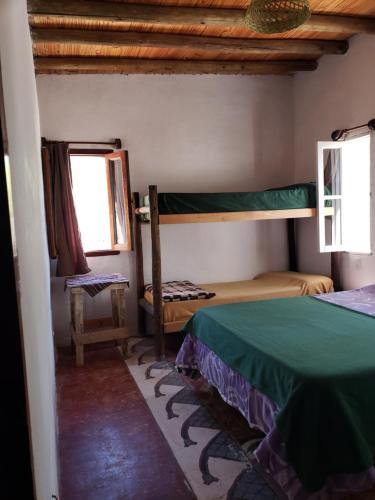 1 queen bed, 4 bunk beds