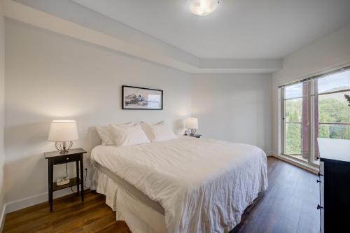 Corner Unit with Sprawling Deck and Views Unit 204 in West Kelowna, Canada