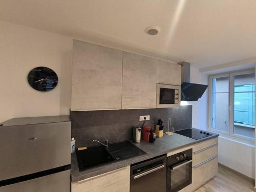 Facilities, T2 -55m2- Elegant et chaleureux in Montbrison