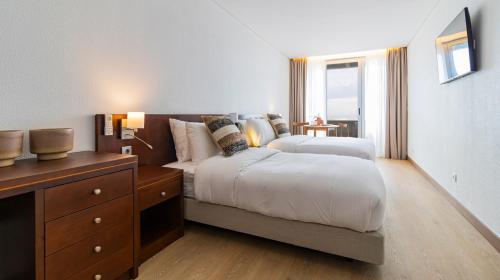Habitación triple, balcón